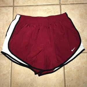 Red Nike athletic shorts